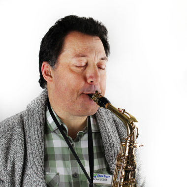 Alan Sleat, Screen Reader Assessor playing the saxophone